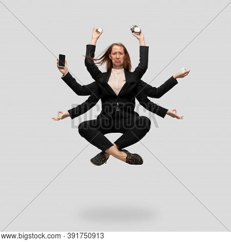 Beautiful Business Woman, Secretary, Multi-armed Manager Levitating Isolated On Grey Studio Backgrou