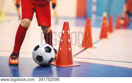 Football Futsal Training For Children. Soccer Training Dribbling Cone Drill. Indoor Soccer Young Pla