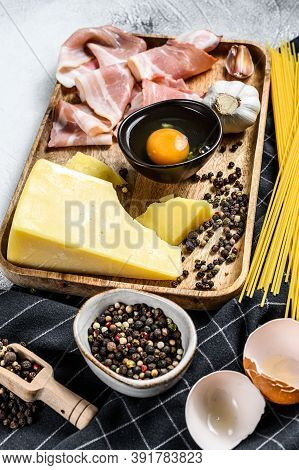 Traidtional Italian Pasta Carbonara Ingredients. Bacon, Spaghetti, Parmesan And Pecorino Cheese, Egg