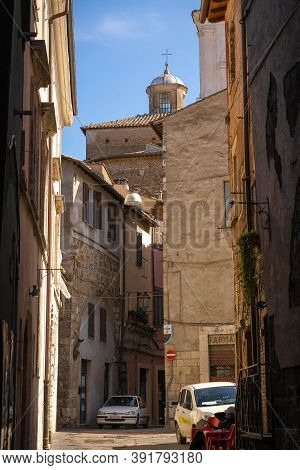 Modern Cars On Street Of  Medieval Town Of Orte In Italy.