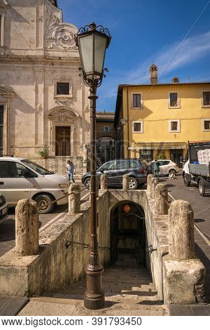 Modern Cars On Street Of  Medieval Town Of Orte In Italy.