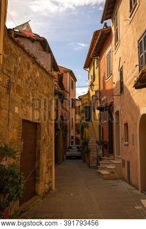 Modern Cars On Street Of  Medieval Town Of Orte In Italy.