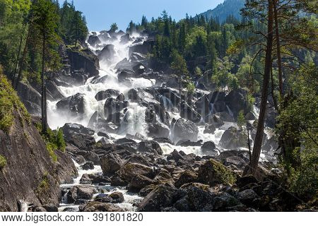 Uchar Waterfall Is The Largest Waterfall In The Altai Mountains. Tulchinskaya Valley, Altai Republic