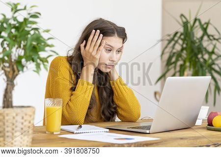 Girl Surprising, Upset And Offended. Beautiful Young Woman Working