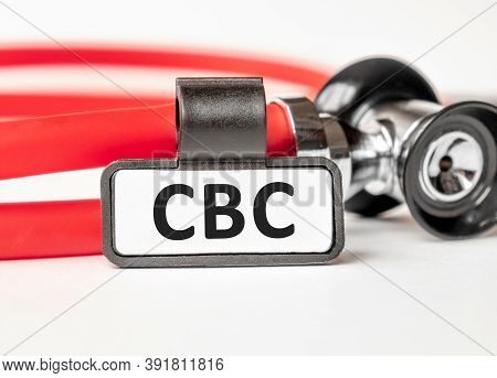 Cbc Complete Blood Count Lettering On A Business Card With A Holder, Next To The Red Stethoscope. Me