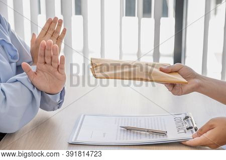 Government Officials Refused To Accept Bribes From The Businessmen Offer For Signing In A Contract O