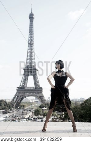Girl Sexy Dancer In Front Of Eifel Tower In Paris, France. Beatuiful Woman In Dance Pose Like Eifel 