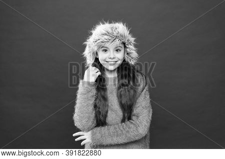 Warm Hat For Cold Winter Weather. Kid Girl Red Background. Soft Furry Accessory. Winter Season. Shop