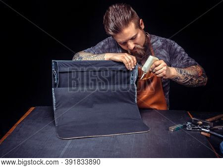 Artisan Of Leather Manufacturing New Leather Product At The Place Of Work
