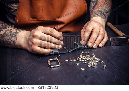 Leather Professional Creates A New Leatherwork At His Studio