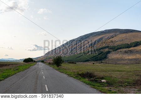 Country Road Through Rural Hillside Autumn Typical Scene Village Asphalt Farming Ground Trasnport