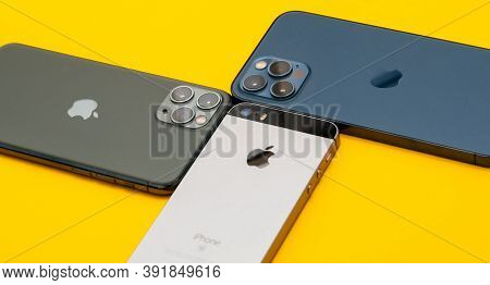 Paris, France - Oct 23, 2020: Close-up View Of Se, 11 Pro And New Iphone 12 Pro Max 5g Smartphone Mo