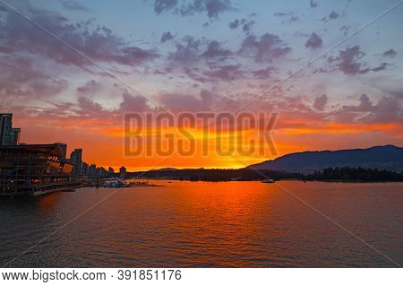 Spectacular Sunset Over Vancouver City Harbor In Brithish Columbia, Canada. Scenic Landscape Litten 