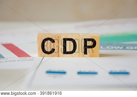 There Is A Piece Of Paper With A Printed Schedule On The Table, The Word Is Written On The Wooden Cu