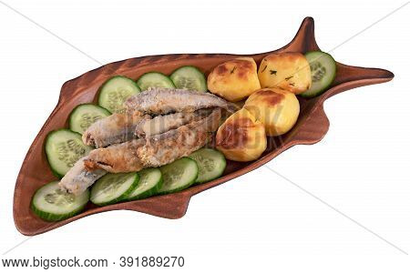 Fried Smelt With Cucumbers And Potatoes In A Fish Form Plate Isolated On A White Background