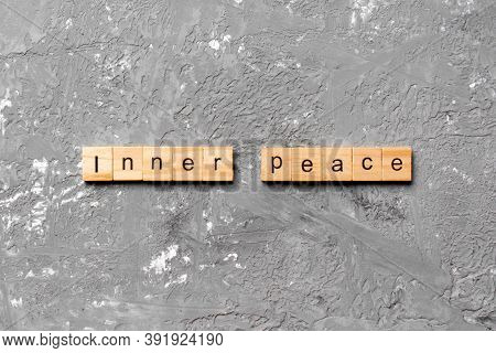 Inner Peace Word Written On Wood Block. Inner Peace Text On Table, Concept