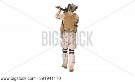 Armed Man In Camouflage With Assault Rifle Looking For A Target