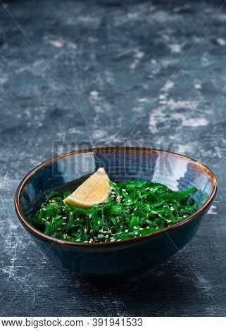 Chuka Laminaria Seaweed Salad With Lime On Plate. Traditional Japanese, Chinese, Korean Asian Seafoo