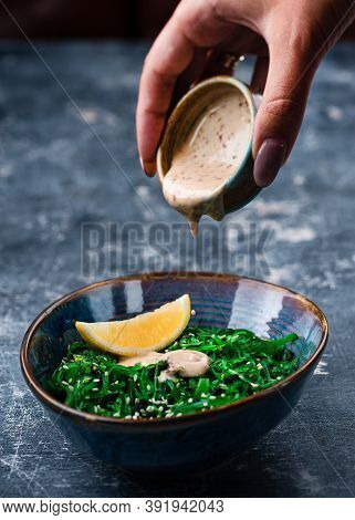 Chuka Laminaria Seaweed Salad With Lime On Plate. Traditional Japanese, Chinese, Korean Asian Seafoo