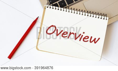 Laptop, Red Pen And Notepad With Text Overview In The White Background