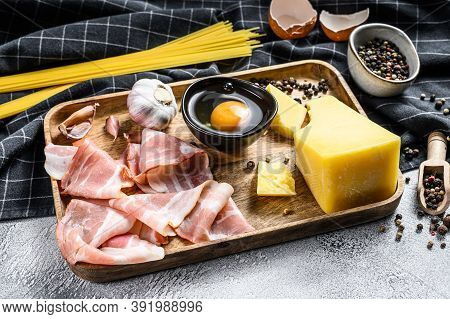 Traidtional Italian Pasta Carbonara Ingredients. Bacon, Spaghetti, Parmesan And Pecorino Cheese, Egg