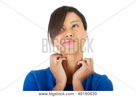 Young beautiful woman scratching her self. Isolated on white 