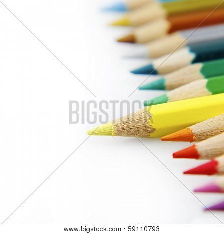 Yellow pencil standing out from others