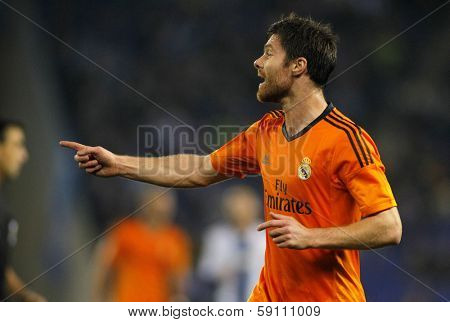 BARCELONA - JAN, 12: Xabi Alonso of Real Madrid during the Spanish League match between Espanyol and Real Madrid at the Estadi Cornella on January 12, 2014 in Barcelona, Spain
