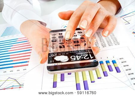 Smart phone (phablet) with a transparent display in human hands. Concept actual future innovative ideas and best technologies humanity.