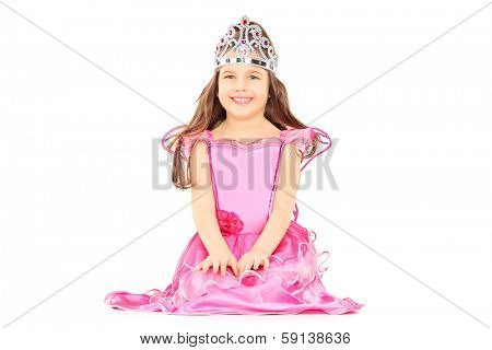 Cute little girl dressed up as princess wearing a tiara isolated on white background