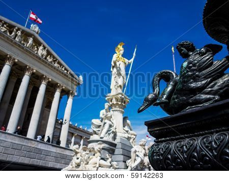 the parliament in vienna, austria. with the statue of 