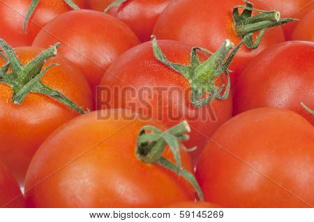 Bunch Of Tomatoes Alongside