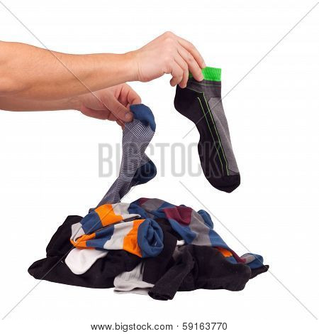 Choose of pile unsorted socks. Isolated