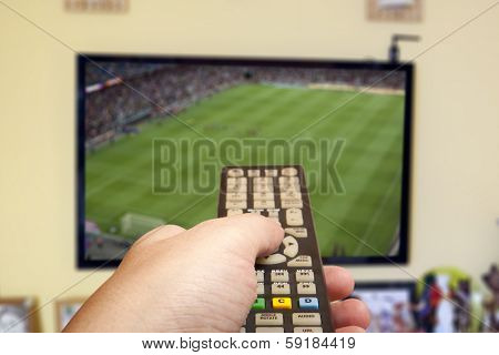 Watching soccer game on TV 