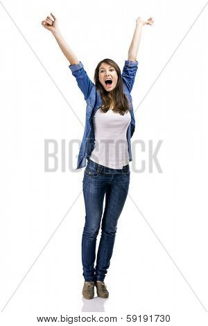 Beautiful woman and verry happy woman with arms on the air, isolated over white background