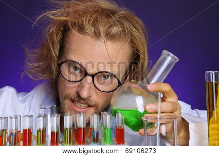 Crazy scientist working in laboratory
