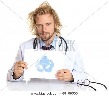 Funny psychotherapist holding Rorschach test