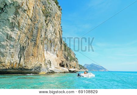 Boat By The Cliff