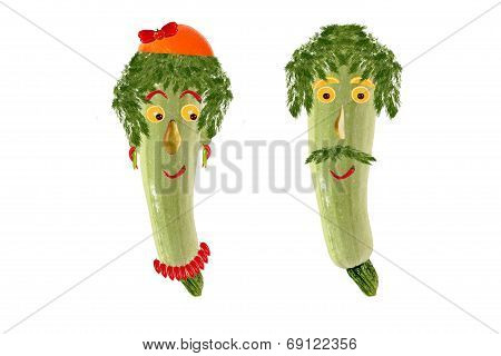Two Funny Portrait Of Men And Women, Made from Zucchini And Fruit