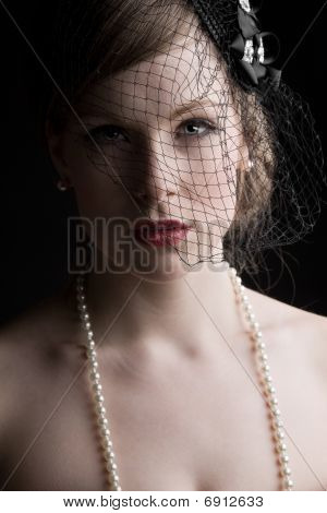 Pretty Model In Veil And Pearls