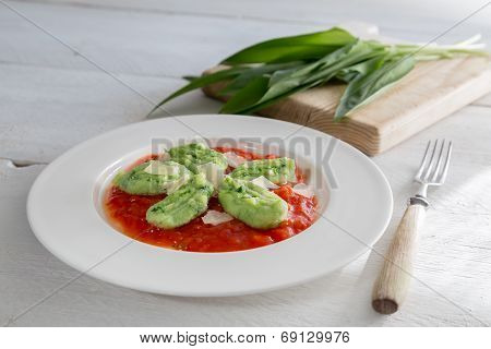 Gnocchi With Wild Garlic In Tomato Sauce And Parmesan Cheese