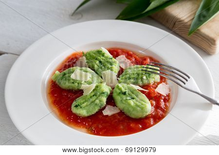 Gnocchi With Wild Garlic In Tomato Sauce And Parmesan Cheese