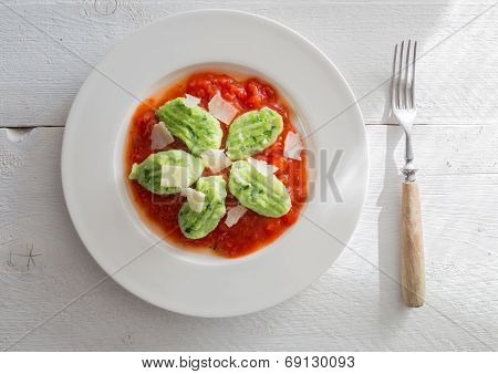 Gnocchi With Wild Garlic In Tomato Sauce And Parmesan Cheese