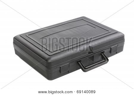 Closed black plastic case.