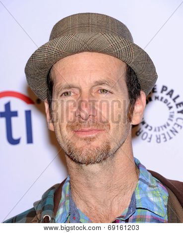 LOS ANGELES - MAR 28:  Denis O'Hare arrives to the Paleyfest 2014: American Horror Story COVEN  on March 28, 2014 in Hollywood, CA                