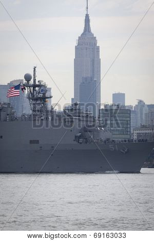 NEW YORK - MAY 27: USS Oak Hill (LSD 051) passes the Empire State Building after departing Pier 92 on the Hudson River at the end of Fleet Week NY on May 27, 2014. 