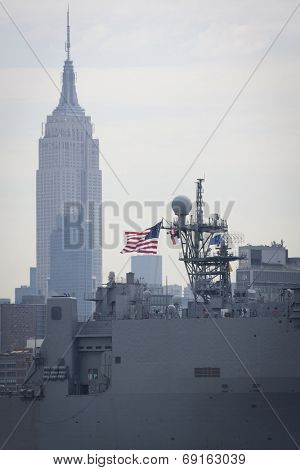 NEW YORK - MAY 27: USS Oak Hill (LSD 051) passes the Empire State Building after departing Pier 92 on the Hudson River at the end of Fleet Week NY on May 27, 2014. 