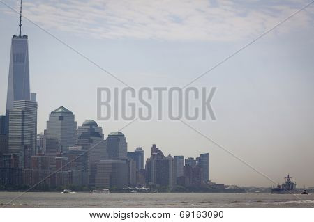 NEW YORK - MAY 27: USS Oak Hill (LSD 051) passes the financial district in Lower Manhattan after departing Pier 92 on the Hudson River at the end of Fleet Week NY on May 27, 2014.  
