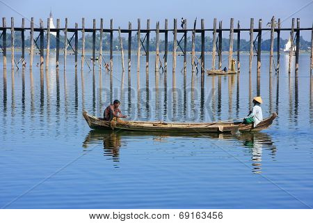 AMARAPURA, MYANMAR - DECEMBER 31: Unidentified people fish in a lake on December 31, 2011 in Amarapu