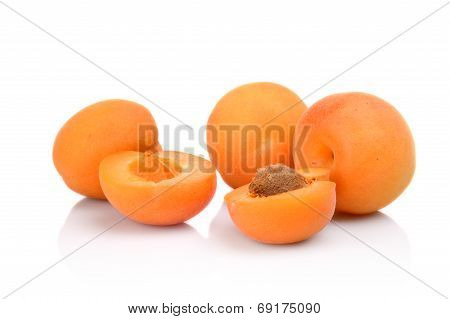 Three Sliced Apricots Isolated On White